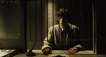 Movie still from “The Double” (2013), directed by Richard Ayoade – Medium shot, Low angle