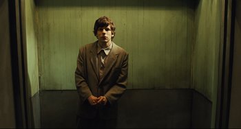 Movie still from “The Double” (2013), directed by Richard Ayoade – Medium shot, Low angle