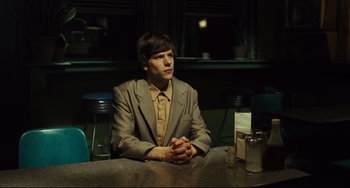 Movie still from “The Double” (2013), directed by Richard Ayoade – Medium shot, Over the shoulder angle