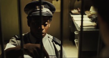 Movie still from “The Double” (2013), directed by Richard Ayoade – Close Up shot, Over the shoulder angle