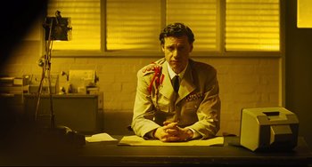 Movie still from “The Double” (2013), directed by Richard Ayoade – Medium shot, Low angle