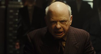 Movie still from “The Double” (2013), directed by Richard Ayoade – Close Up shot, Over the shoulder angle