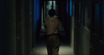 Movie still from “The Double” (2013), directed by Richard Ayoade – Wide shot, Over the shoulder angle
