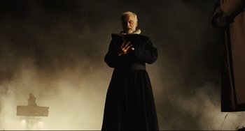 Movie still from “The Double” (2013), directed by Richard Ayoade – Medium shot, Low angle