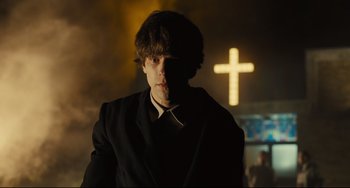 Movie still from “The Double” (2013), directed by Richard Ayoade – Medium shot, Low angle