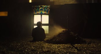 Movie still from “The Double” (2013), directed by Richard Ayoade – Wide shot, Low angle