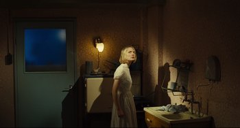 Movie still from “The Double” (2013), directed by Richard Ayoade – Medium shot, Low angle