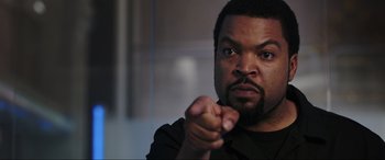 Movie still from “22 Jump Street” (2014), directed by Phil Lord – A person pointing a finger at the camera; Close Up shot, Over the shoulder angle