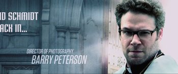 Movie still from “22 Jump Street” (2014), directed by Phil Lord – A person wearing glasses and a suit; Extreme Close Up shot, Low angle