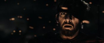 Movie still from “300” (2006), directed by Zack Snyder – A person with a beard; Close Up shot, Low angle