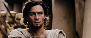 Movie still from “300” (2006), directed by Zack Snyder – A person with a beard; Close Up shot, Low angle