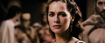 Movie still from “300” (2006), directed by Zack Snyder – A person wearing a necklace; Close Up shot, Low angle