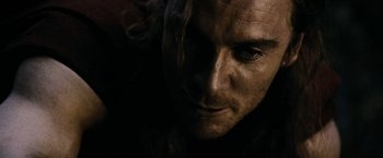 Movie still from “300” (2006), directed by Zack Snyder – A man with long hair; Extreme Close Up shot, Low angle