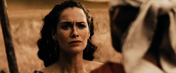 Movie still from “300” (2006), directed by Zack Snyder – A person looking at the camera; Close Up shot, Over the shoulder angle