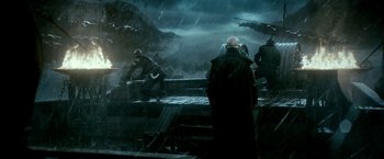 Movie still from “300: Rise of an Empire” (2014), directed by Noam Murro – A group of men standing on top of a hill; Wide shot, Over the shoulder angle