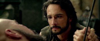 Movie still from “300: Rise of an Empire” (2014), directed by Noam Murro – A person with a beard; Close Up shot, Over the shoulder angle