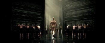 Movie still from “300: Rise of an Empire” (2014), directed by Noam Murro – A group of people in a room with lights on them; Extreme Wide shot, Low angle