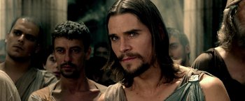 Movie still from “300: Rise of an Empire” (2014), directed by Noam Murro – A person with long hair and a beard; Close Up shot, Over the shoulder angle
