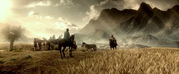 Movie still from “300: Rise of an Empire” (2014), directed by Noam Murro – Two men on horseback herding cattle through a field; Extreme Wide shot, Low angle