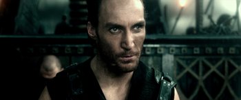 Movie still from “300: Rise of an Empire” (2014), directed by Noam Murro – A person wearing a black shirt; Close Up shot, Over the shoulder angle