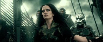 Movie still from “300: Rise of an Empire” (2014), directed by Noam Murro – A woman with long black hair wearing a black outfit; Close Up shot, Low angle