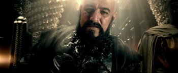 Movie still from “300: Rise of an Empire” (2014), directed by Noam Murro – A bald man with a beard and a mustache; Close Up shot, Low angle