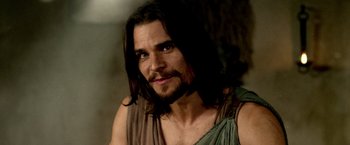 Movie still from “300: Rise of an Empire” (2014), directed by Noam Murro – A person with long black hair; Close Up shot, Over the shoulder angle