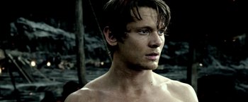 Movie still from “300: Rise of an Empire” (2014), directed by Noam Murro – A person wearing a shirt; Close Up shot, Over the shoulder angle