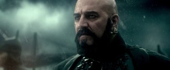 Movie still from “300: Rise of an Empire” (2014), directed by Noam Murro – A bald man with a beard and a mustache; Close Up shot, Low angle