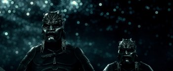 Movie still from “300: Rise of an Empire” (2014), directed by Noam Murro – Two people wearing masks in the dark; Close Up shot, Low angle