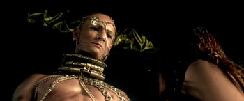 Movie still from “300: Rise of an Empire” (2014), directed by Noam Murro – A bald man with lots of gold chains around his neck; Close Up shot, Low angle