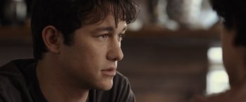 Movie still from “500 Days of Summer” (2009), directed by Marc Webb – A person looking at the camera; Close Up shot, Over the shoulder angle