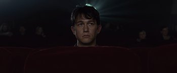 Movie still from “500 Days of Summer” (2009), directed by Marc Webb – A young man is staring into the camera; Close Up shot, Low angle