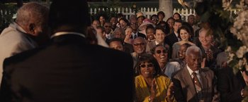 Movie still from “500 Days of Summer” (2009), directed by Marc Webb – A group of people standing in front of each other; Medium shot, Over the shoulder angle