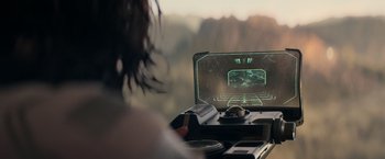 Movie still from “65” (2023), directed by Bryan Woods – A person looking at a computer screen; Extreme Close Up shot, High angle