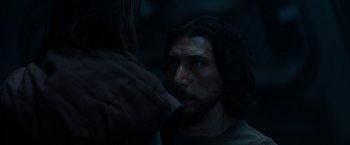 Movie still from “65” (2023), directed by Bryan Woods – A person with long black hair; Close Up shot, Over the shoulder angle