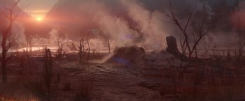 Movie still from “65” (2023), directed by Bryan Woods – A very dusty area with a lot of smoke coming out of it; Extreme Wide shot, High angle