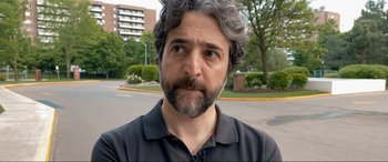 Movie still from “752 Is Not a Number” (2022), directed by Babak Payami – Close Up shot, Over the shoulder angle