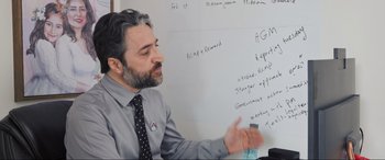 Movie still from “752 Is Not a Number” (2022), directed by Babak Payami – Close Up shot, Over the shoulder angle