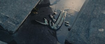 Movie still from “752 Is Not a Number” (2022), directed by Babak Payami – View of a car's hood; Extreme Close Up shot, Overhead angle