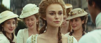 Movie still from “The Duchess” (2008), directed by Saul Dibb – A person with long hair; Close Up shot, Over the shoulder angle