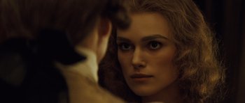 Movie still from “The Duchess” (2008), directed by Saul Dibb – A person looking at a mirror; Close Up shot, Over the shoulder angle