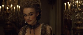 Movie still from “The Duchess” (2008), directed by Saul Dibb – A person wearing a dress; Close Up shot, Over the shoulder angle