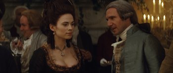 Movie still from “The Duchess” (2008), directed by Saul Dibb – A man and a woman dressed in period clothing; Close Up shot, Over the shoulder angle