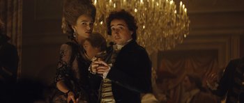 Movie still from “The Duchess” (2008), directed by Saul Dibb – A man and a woman standing next to each other; Medium shot, Low angle