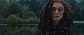 Movie still from “The Duchess” (2008), directed by Saul Dibb – A woman with a black veil on her head looking into the distance; Close Up shot, Over the shoulder angle
