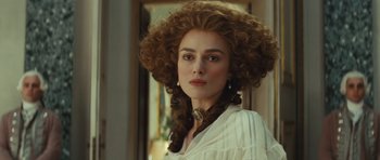 Movie still from “The Duchess” (2008), directed by Saul Dibb – A person wearing a white shirt; Close Up shot, Over the shoulder angle