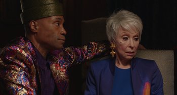 Movie still from “80 for Brady” (2023), directed by Kyle Marvin – An older woman sitting next to an older man; Close Up shot, Over the shoulder angle