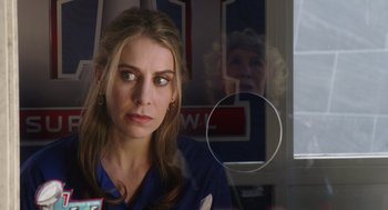 Movie still from “80 for Brady” (2023), directed by Kyle Marvin – A woman is looking out of a window; Close Up shot, Over the shoulder angle