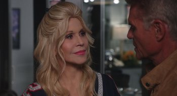 Movie still from “80 for Brady” (2023), directed by Kyle Marvin – A woman with blonde hair is talking to a man; Close Up shot, Over the shoulder angle